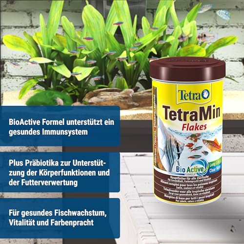 TetraMin (Hauptfutter für alle Zierfische in Flockenform, für ein langes und gesundes Fischleben und klares Wasser, plus Präbiotika für verbesserte Körperfunktionen und Futterverwertung), 500 ml Dose - 3